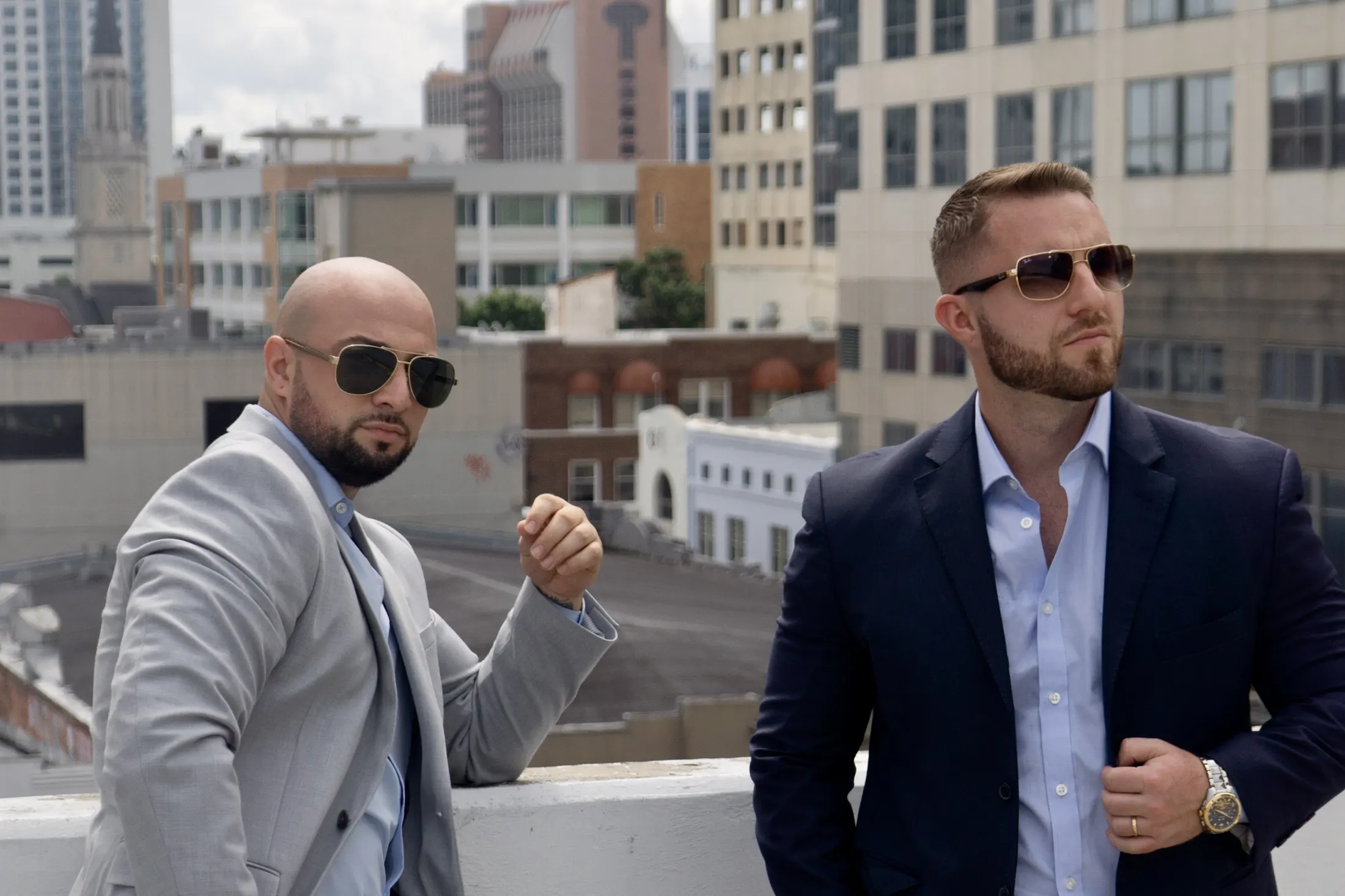 Team leads Michael Masters and Mikael Khaldi on a rooftop in downtown Orlando